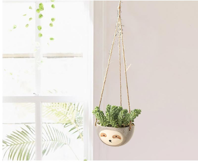Vaso em formato de preguiça para pendurar plantas
